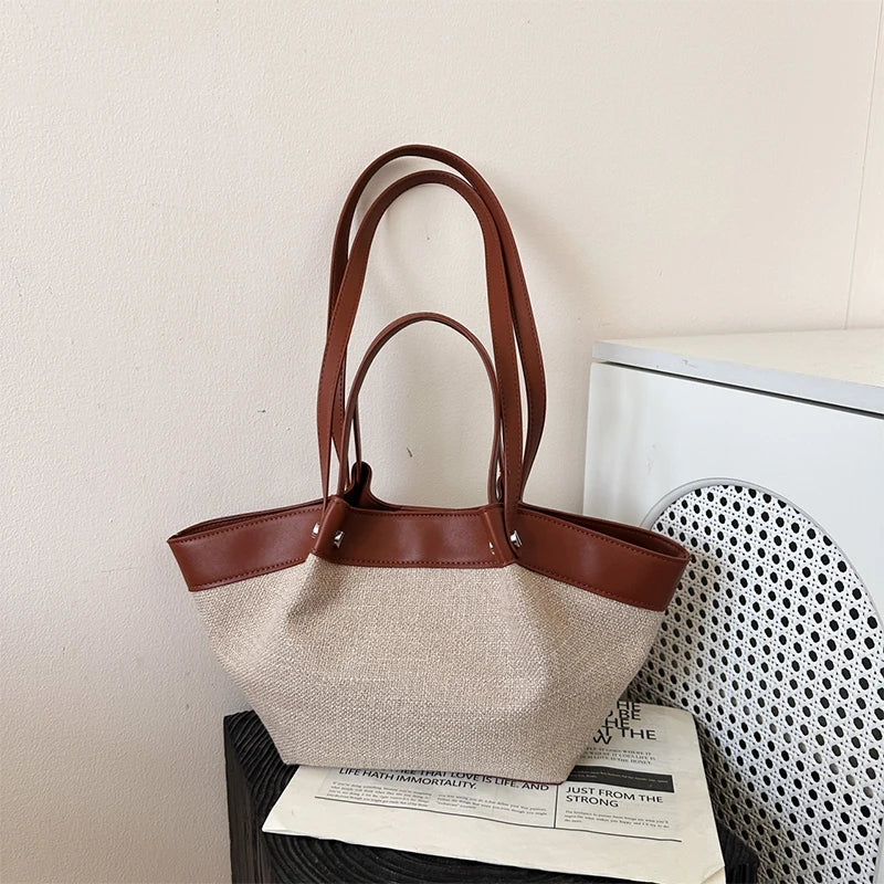 Canvas Leather Brand Wing Shoulder Bag Niche Luxury Fashion New Versatile Commuter Large Capacity High-end Tassel Underarm Bag