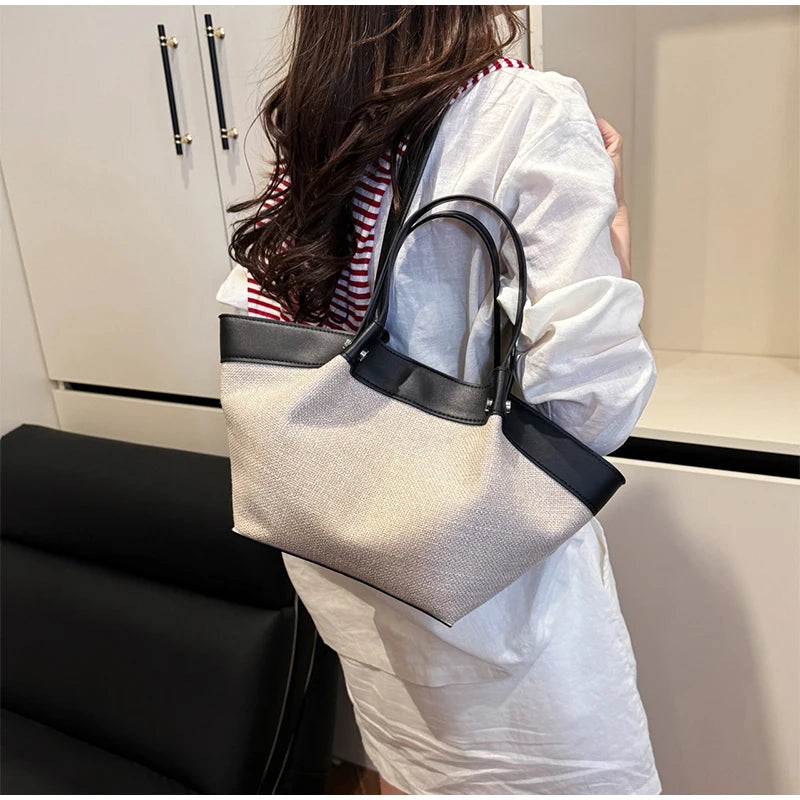 Canvas Leather Brand Wing Shoulder Bag Niche Luxury Fashion New Versatile Commuter Large Capacity High-end Tassel Underarm Bag