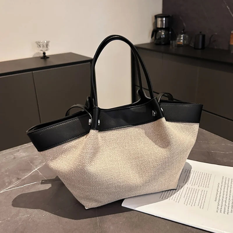 Canvas Leather Brand Wing Shoulder Bag Niche Luxury Fashion New Versatile Commuter Large Capacity High-end Tassel Underarm Bag