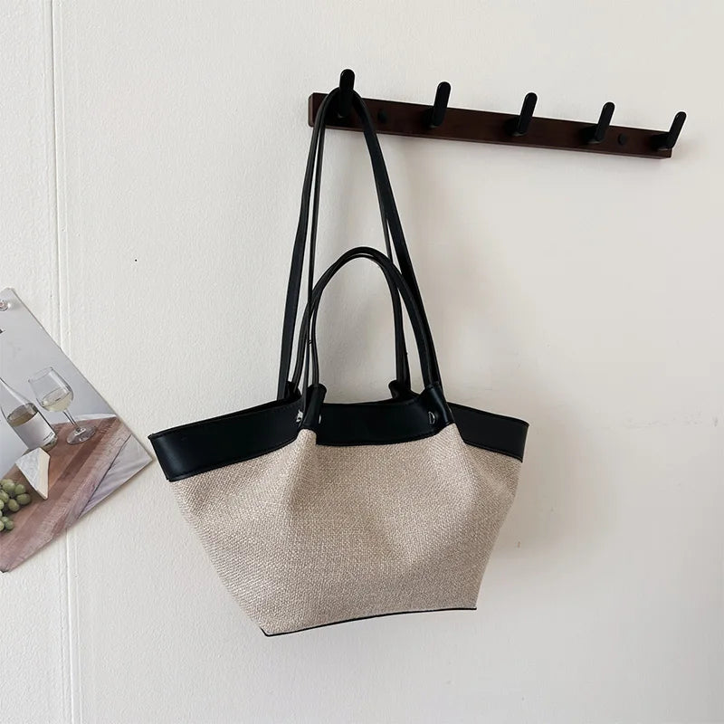 Canvas Leather Brand Wing Shoulder Bag Niche Luxury Fashion New Versatile Commuter Large Capacity High-end Tassel Underarm Bag