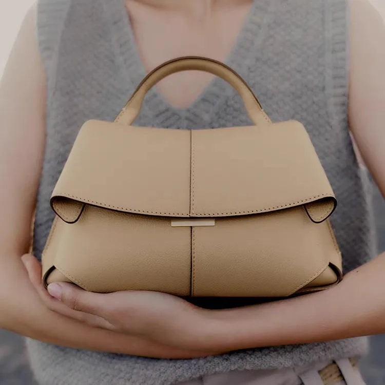 French niche hand-held diagonal cross women's bag new trend Mokki series fashionable pleated smile bag