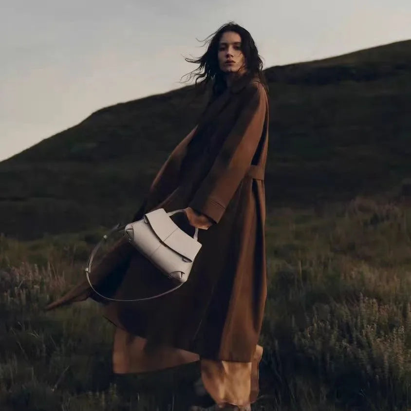 French niche hand-held diagonal cross women's bag new trend Mokki series fashionable pleated smile bag