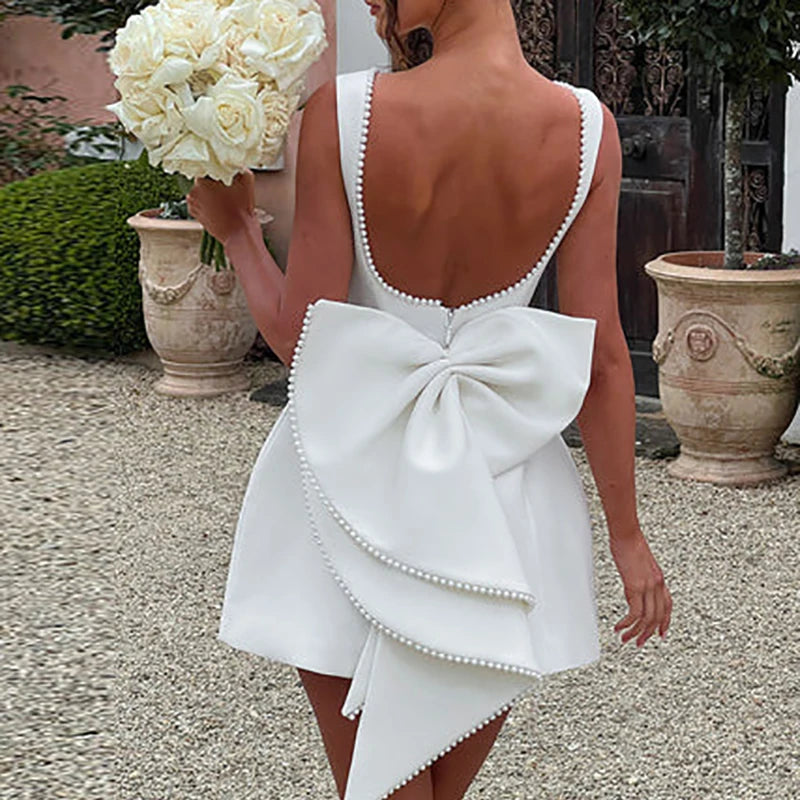 Fashion O Neck Waist Solid Short Dress Pearl Patchwork Slim Women A-line Dress Sexy Hollow Out Backless Bow Party Dress Vestidos