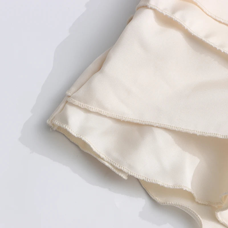 TWOTWINSTYLE Solid Spliced Ruffles Slimming Dresses For Women O Neck Sleeveless High Waist Temperament Mini Dress Female Fashion