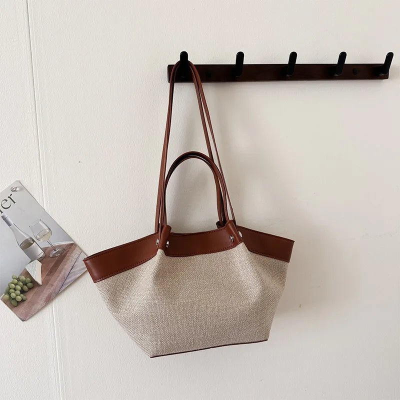 Canvas Leather Brand Wing Shoulder Bag Niche Luxury Fashion New Versatile Commuter Large Capacity High-end Tassel Underarm Bag