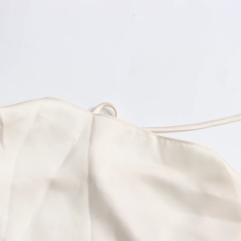 TWOTWINSTYLE Solid Spliced Ruffles Slimming Dresses For Women O Neck Sleeveless High Waist Temperament Mini Dress Female Fashion