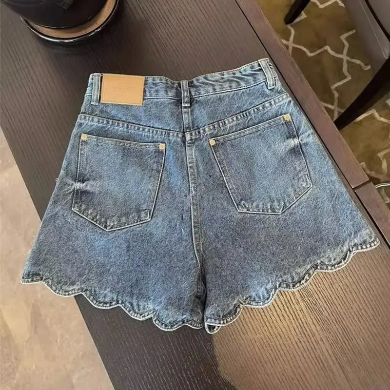 Retro high-waisted jeans women's summer new high fashion temperament design casual Joker wavy shorts. baggy jeans women