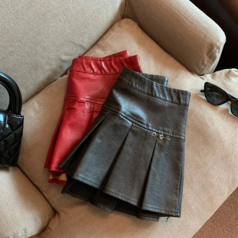 American PU Leather Pleated Skirt Women Slim High-waisted Design Mini Skirt Red Black