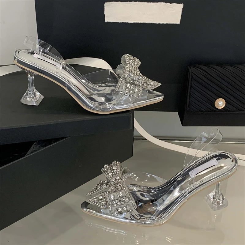 Aneikeh Sexy Pointed Toe Bow Crystal PVC Transparent Women Slingbacks Pumps Elegant Thin High Heels Strippers Prom Mule Shoes