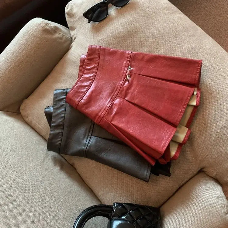 American PU Leather Pleated Skirt Women Slim High-waisted Design Mini Skirt Red Black