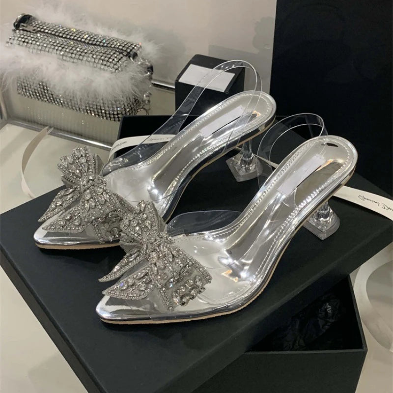 Aneikeh Sexy Pointed Toe Bow Crystal PVC Transparent Women Slingbacks Pumps Elegant Thin High Heels Strippers Prom Mule Shoes