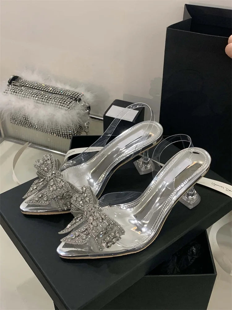 Aneikeh Sexy Pointed Toe Bow Crystal PVC Transparent Women Slingbacks Pumps Elegant Thin High Heels Strippers Prom Mule Shoes