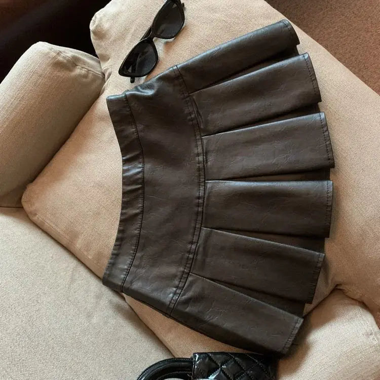 American PU Leather Pleated Skirt Women Slim High-waisted Design Mini Skirt Red Black